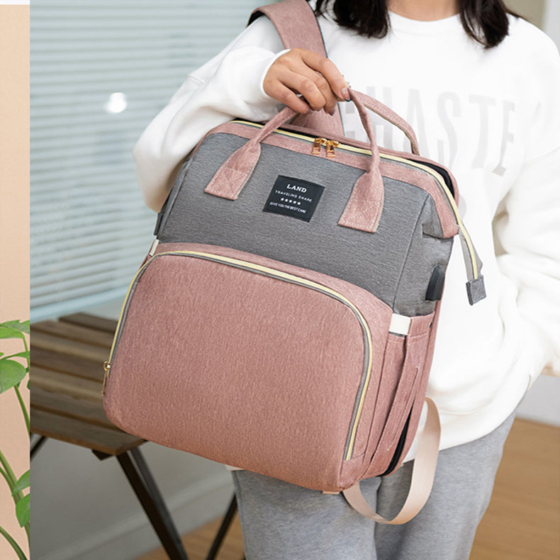 A smart 2-in-1 diaper backpack that transforms into a portable baby crib in seconds. Perfect for travel, outings, and busy UAE moms who want convenience without carrying extra gear.